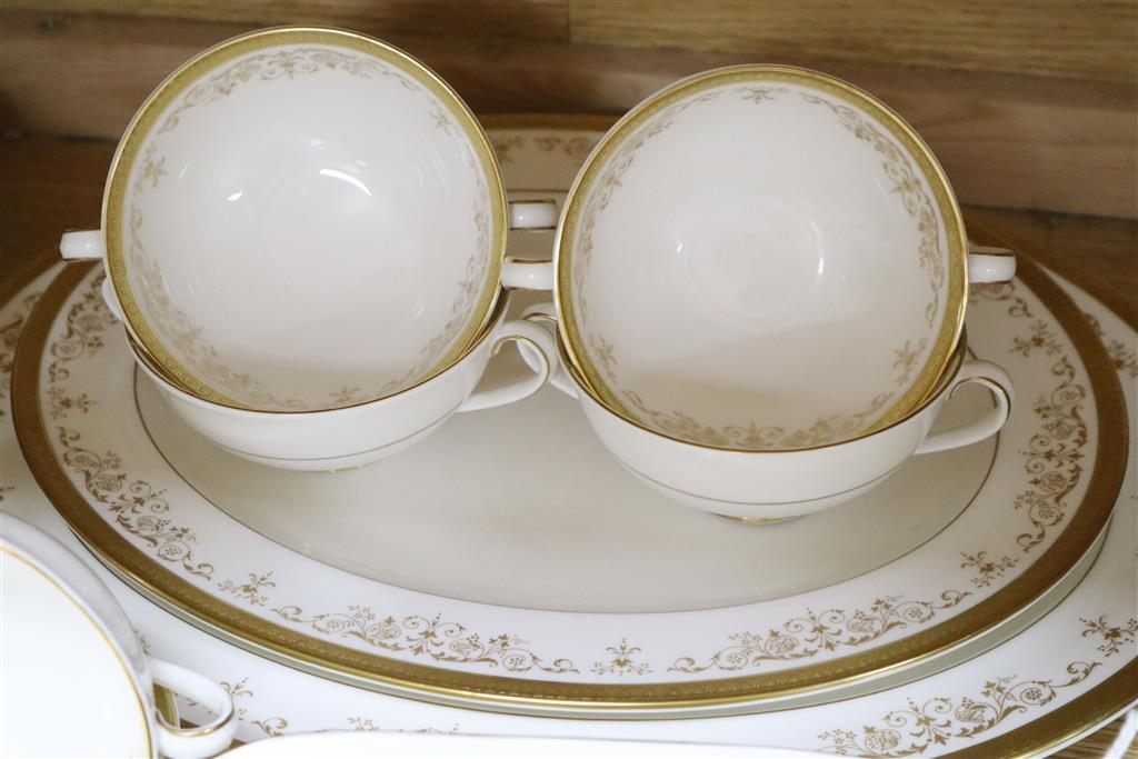 A Royal Doulton Belmont pattern part dinner and coffee dinner service with gilt decoration